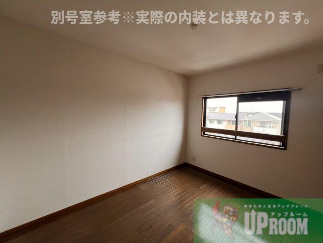 ハピネス八光の洋室