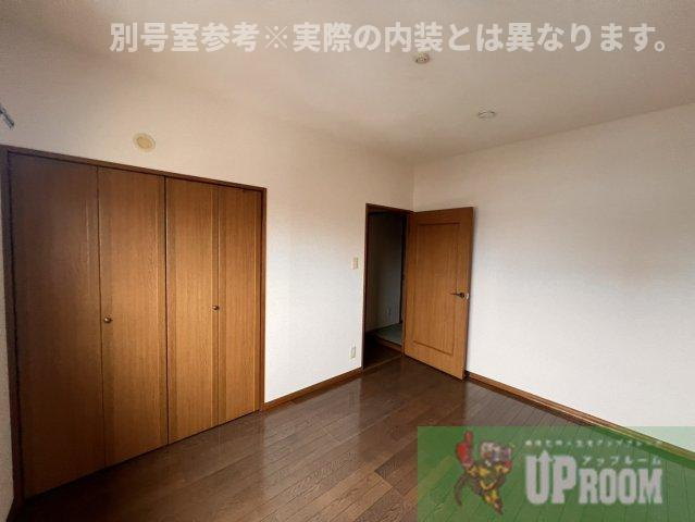 ハピネス八光の洋室