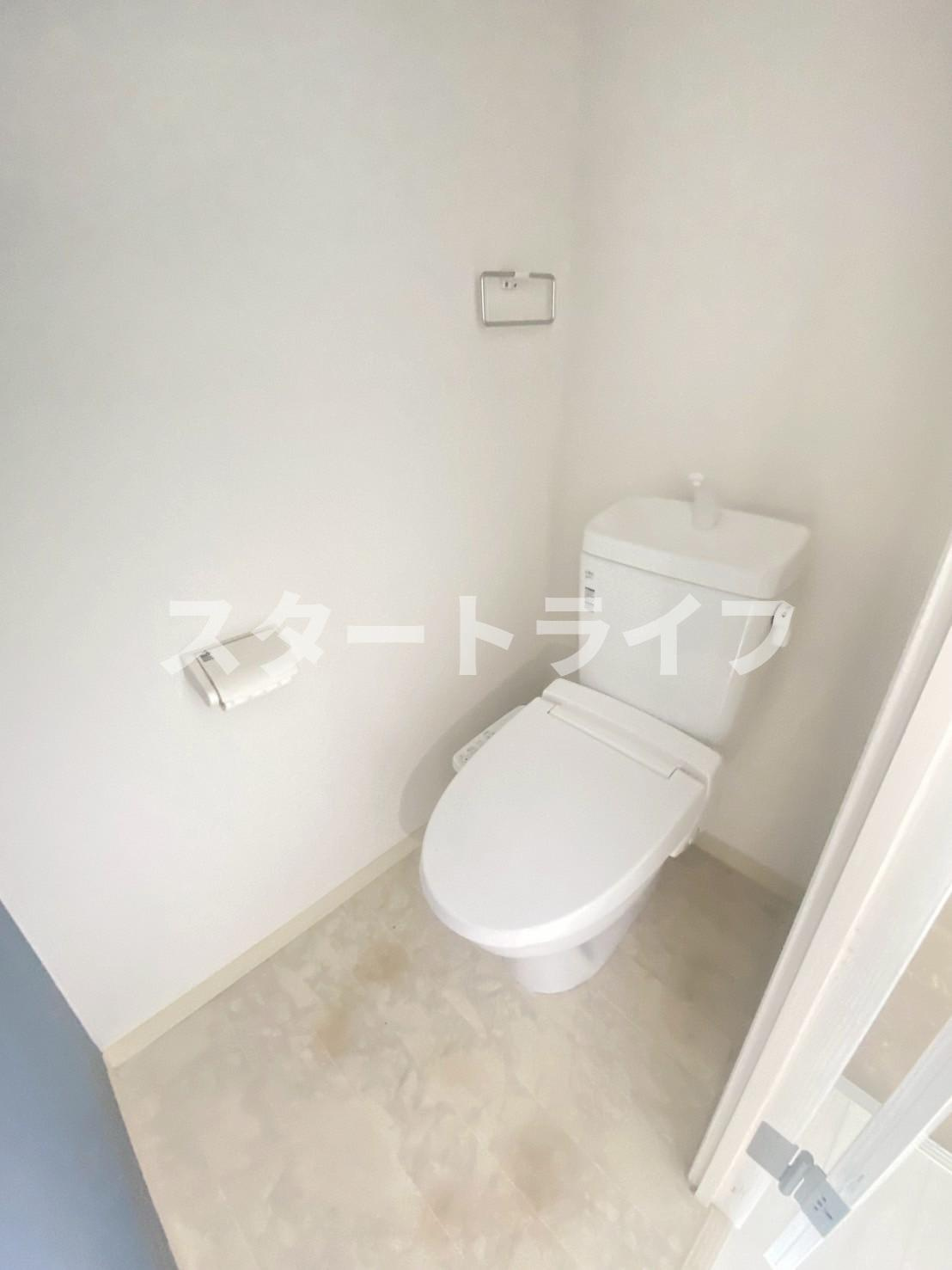 大阪市淀川区木川西３丁目の賃貸マンションのトイレ
