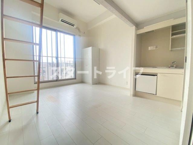 大阪市淀川区木川西３丁目の賃貸マンションの居間・リビング