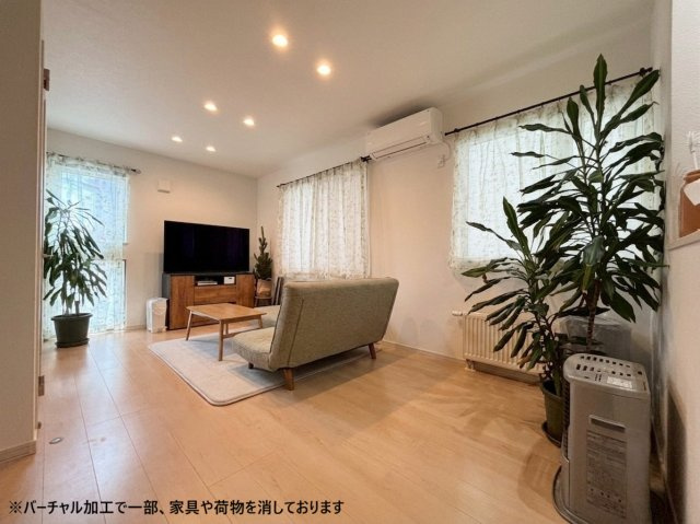 稲穂１条２丁目　戸建の居間・リビング|14.5帖のLDK