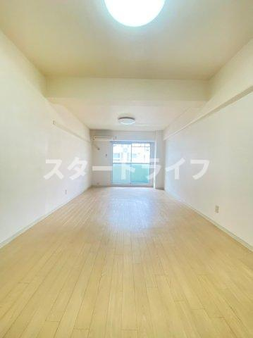 大阪市淀川区西中島６丁目の賃貸マンションの居間・リビング