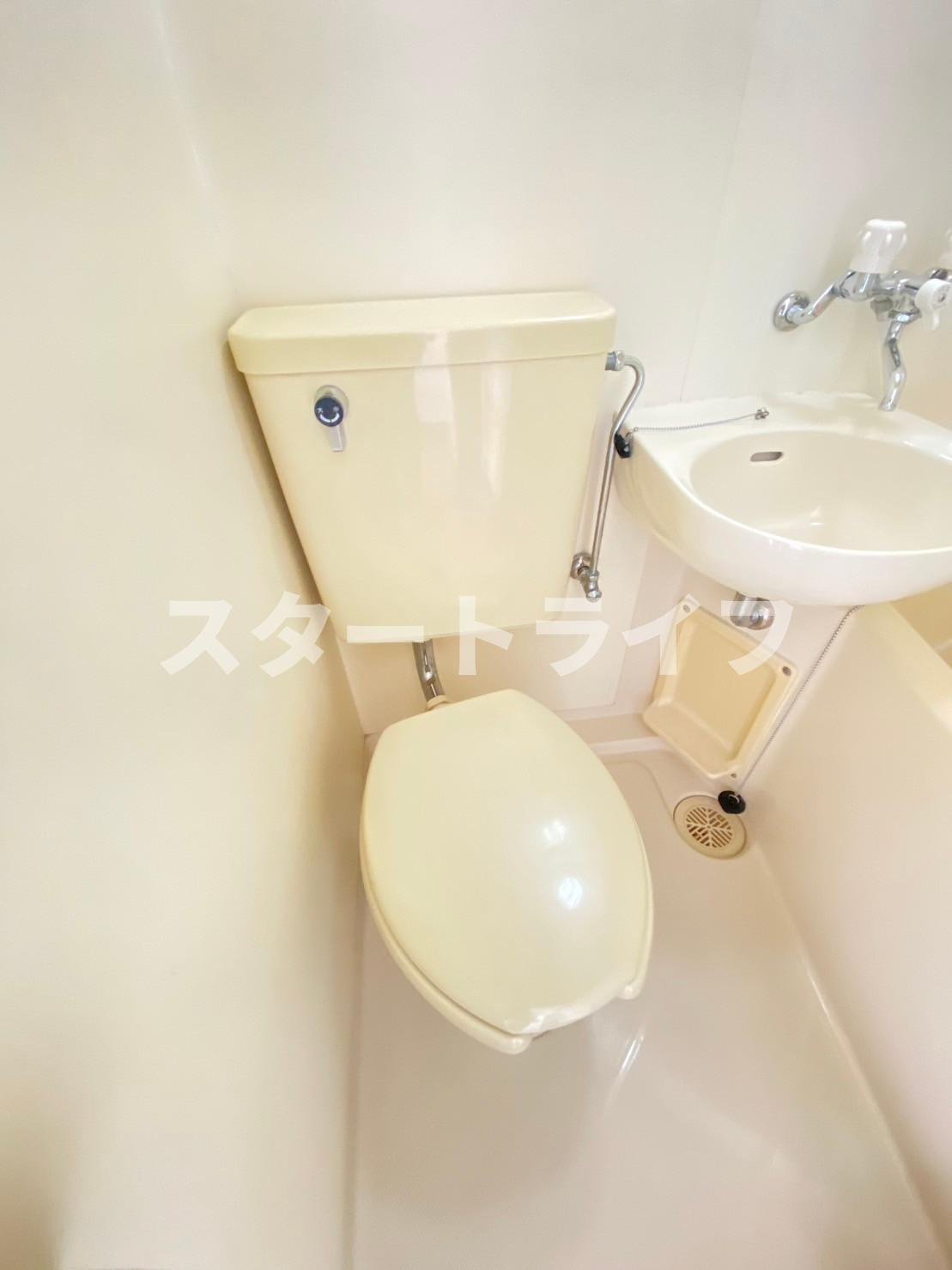 大阪市東淀川区西淡路２丁目の賃貸マンションのトイレ