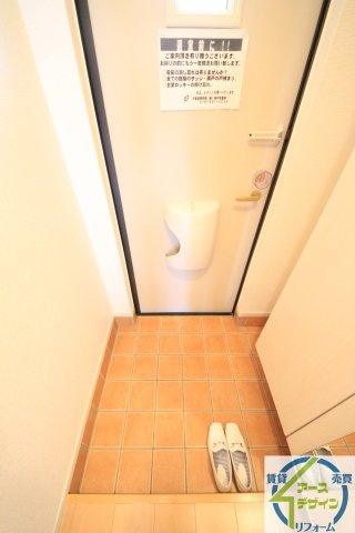 コスモグレイスＢの玄関