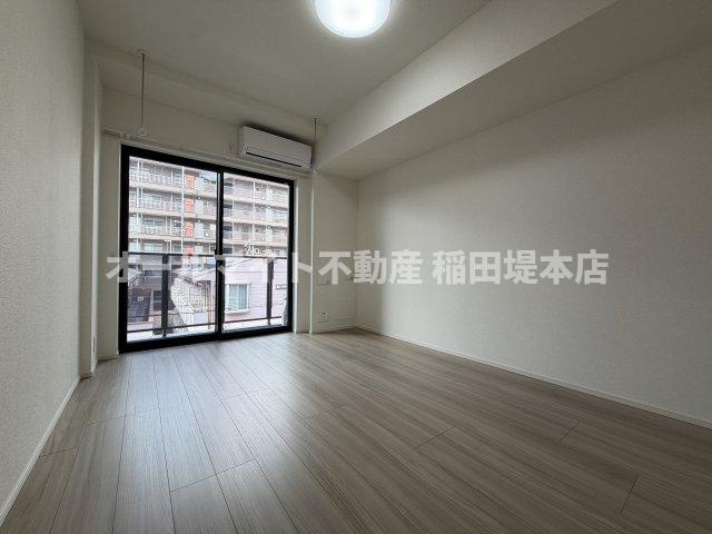 川崎市多摩区登戸新町の賃貸マンションの居間・リビング