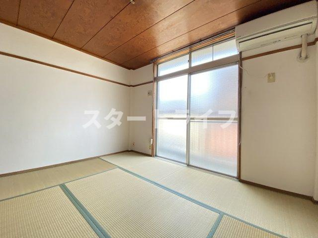 大阪市淀川区新高２丁目の賃貸マンションの寝室