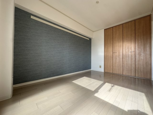 ニューラージあびこの洋室