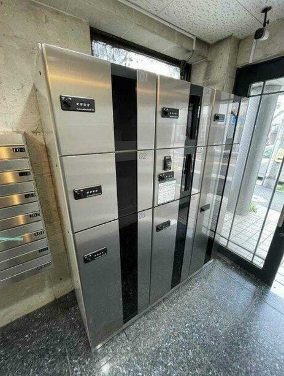 グランドエクセル祐天寺　冷蔵庫　シェアサイクル　室内洗濯機置場のロビー