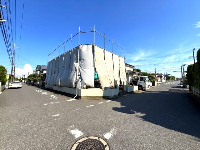 売地　柏市松葉町6丁目2号棟の前面道路含む現地写真