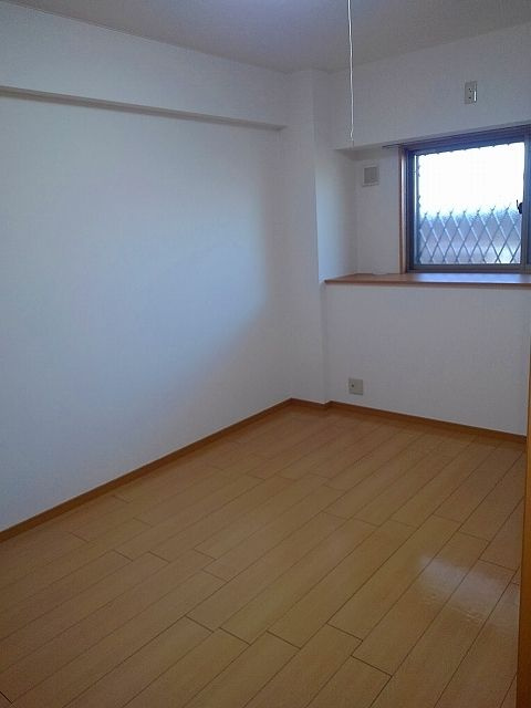 グランドールかさでらの寝室