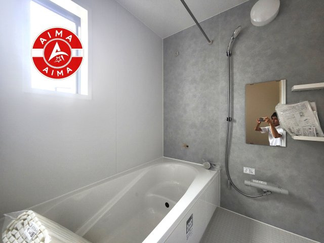 福岡市東区奈多3丁目第1-4棟（3号棟）の内観：施工例|1日の疲れを癒してくれる広々バスルーム。雨の日のお洗濯にも大活躍な浴室乾燥機付です！