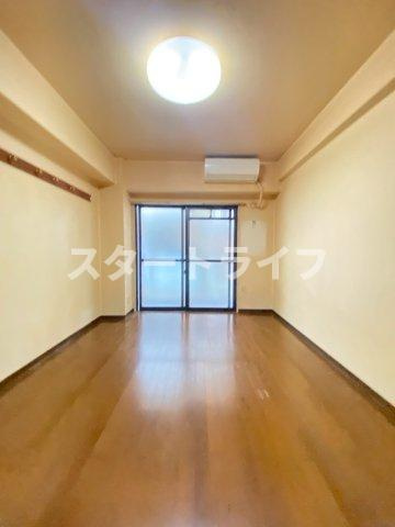 大阪市淀川区三国本町２丁目の賃貸マンションの居間・リビング