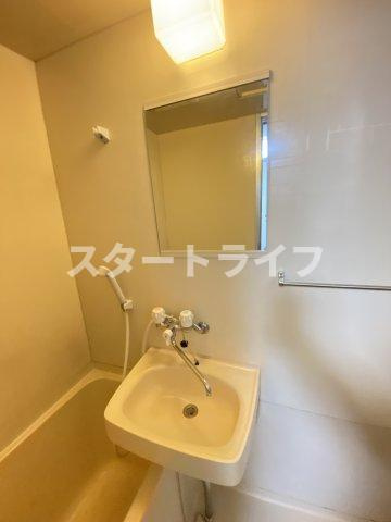大阪市淀川区十三本町２丁目の賃貸マンションの洗面所