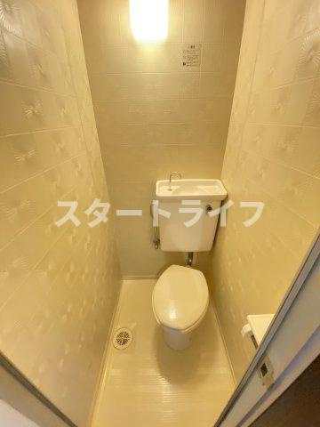大阪市淀川区十三本町２丁目の賃貸マンションのトイレ
