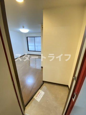 大阪市淀川区十三本町２丁目の賃貸マンションの玄関