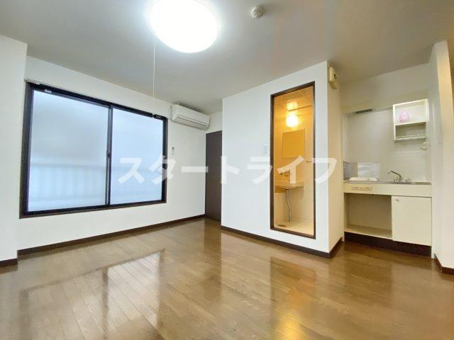 大阪市淀川区十三本町２丁目の賃貸マンションの居間・リビング