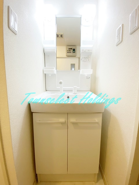 藤沢市円行２丁目の賃貸マンションの洗面所