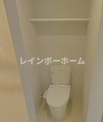 松戸市上本郷の賃貸マンションのトイレ|落ち着いた色調のトイレです