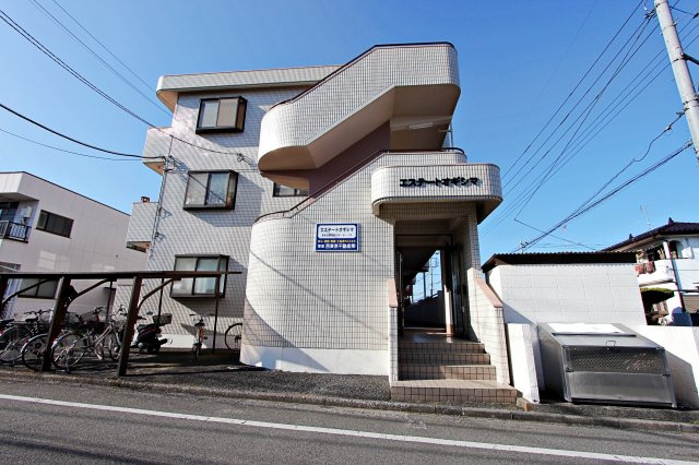 エステートオギシマの居間・リビング|LDK（12帖）と洗濯機置き場 ※101号室は洗濯機扉なし