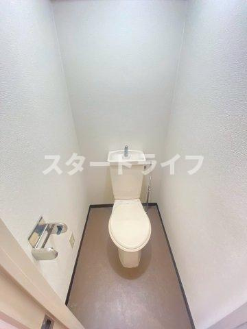大阪市東淀川区菅原３丁目の賃貸マンションのトイレ