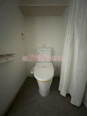 プレイス久留米中央のトイレ|落ち着いた色調のトイレです