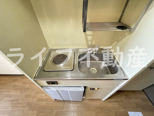 オーシャン新深江のキッチン|コンパクトなキッチンで掃除もラクラク