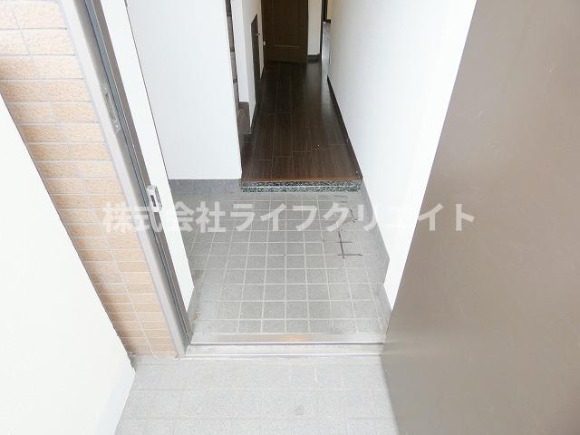レジデンス光和114の玄関