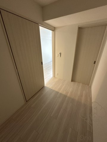 コンフォリア・リヴ東梅田の寝室