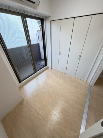 トモ南堀江の寝室