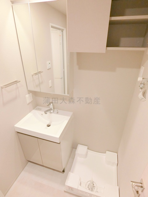 プラウドフラット西蒲田の洗面所|独立洗面台　洗濯機置き場　洗面脱衣所