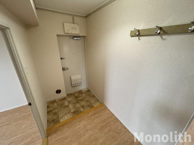 光明池駅前４号棟の玄関