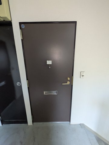 コーポレーションUの玄関