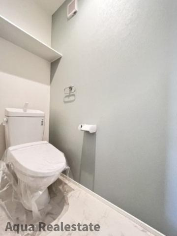オール電化デザイナーズハウス北島町中村建売⑰のトイレ|落ち着いた色調のトイレです　