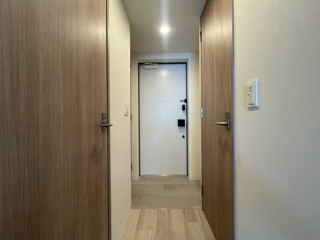 コンフォリア・リヴ本町WEST　Qの玄関