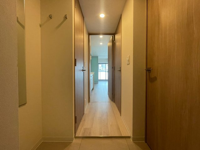 コンフォリア・リヴ本町WEST　Qの玄関