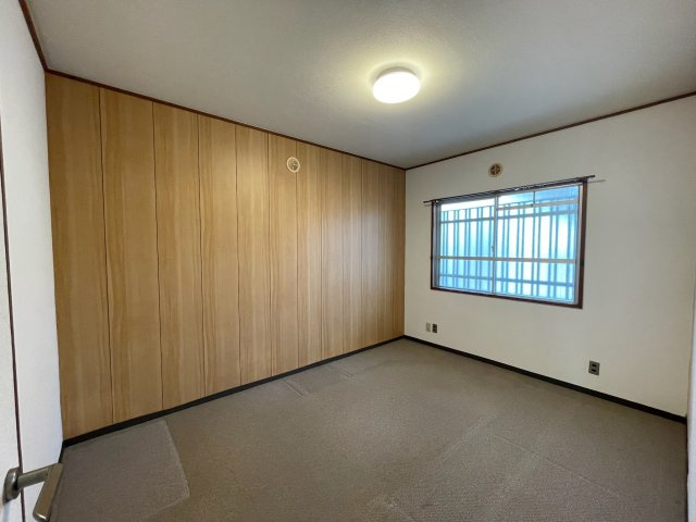 ハイツ東朝霧の洋室
