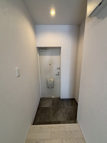 フェザー豊中マンションの玄関