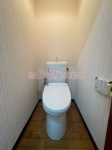 オアシスビルのトイレ|落ち着いた色調のトイレです