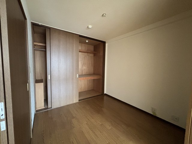 フェザー豊中マンションの寝室