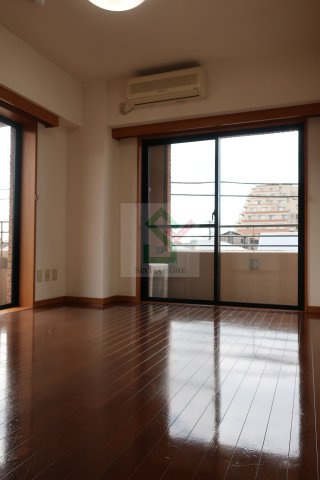 テック高野台の寝室