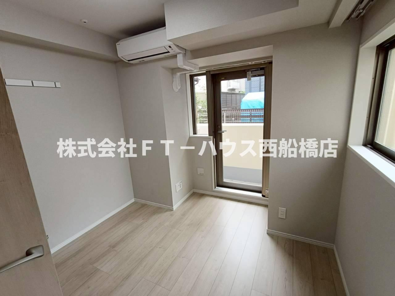 Alivis原木中山の洋室