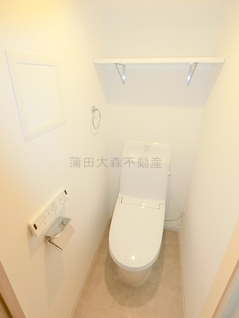 REGOLITH IKEGAMIのトイレ|棚付きの温水洗浄便座付きのトイレ