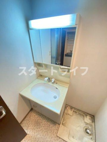 大阪市淀川区十三東３丁目の賃貸マンションの洗面所