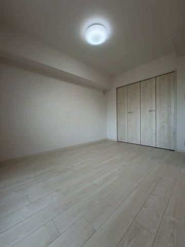 コープ野村あいの里エスパシオ壱番館の洋室