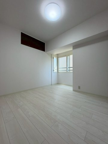 コープ野村あいの里エスパシオ壱番館の洋室