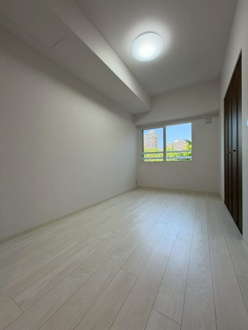 コープ野村あいの里エスパシオ壱番館の洋室