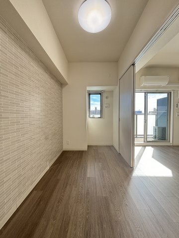 プレサンスDOMECITYコレーレの寝室