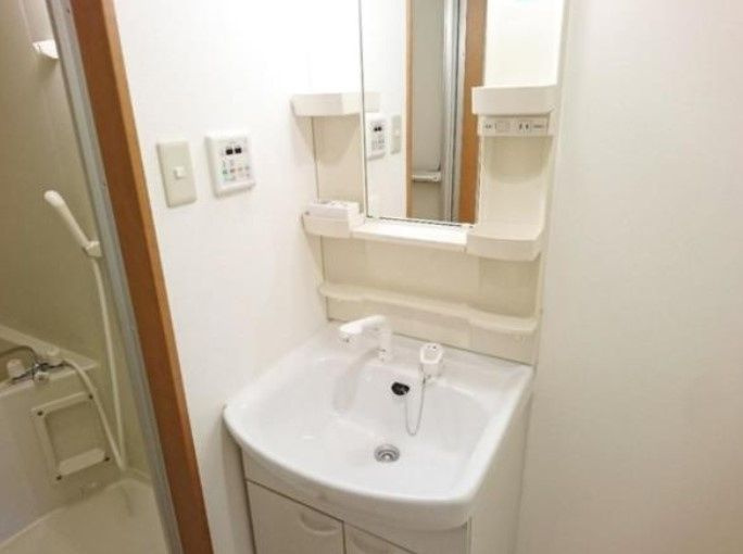 マンションプラティーノの洗面所|別部屋参考写真となります