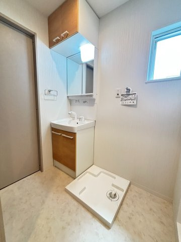 ナチュラルフロント住居の洗面所