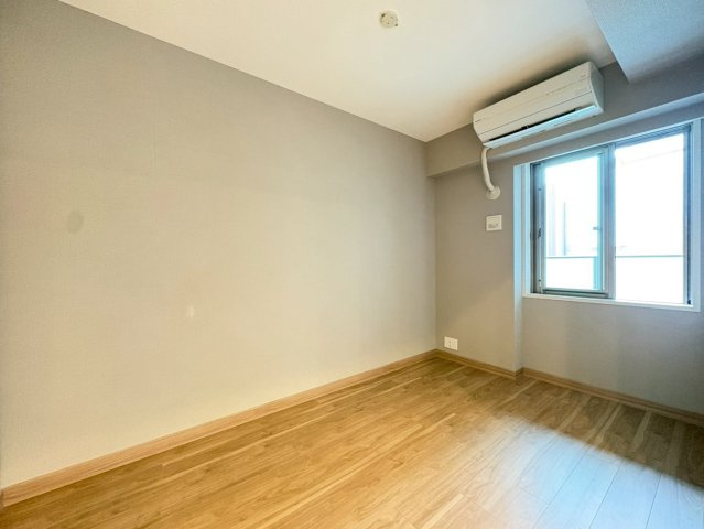 グランドメゾン新梅田タワー THE CLUB RESIDENCEの寝室|リビング